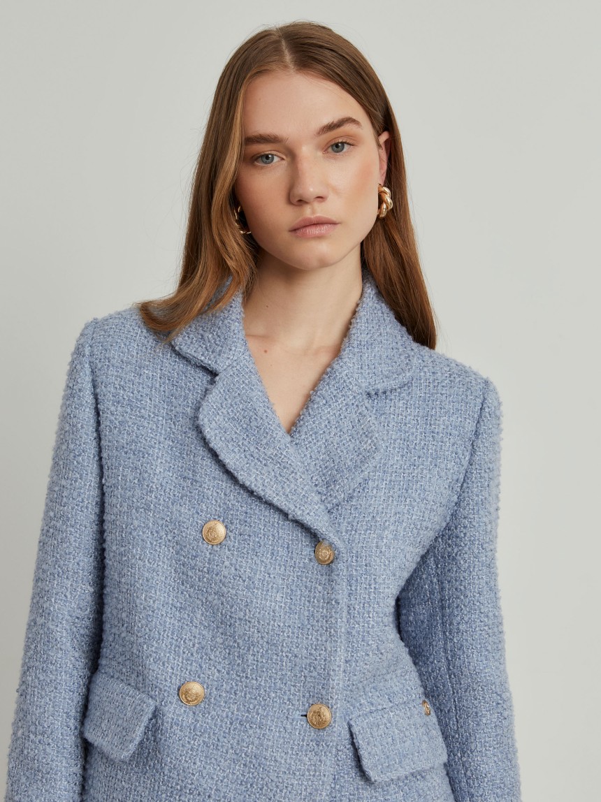 Casaco tweed cruzado com bolsos