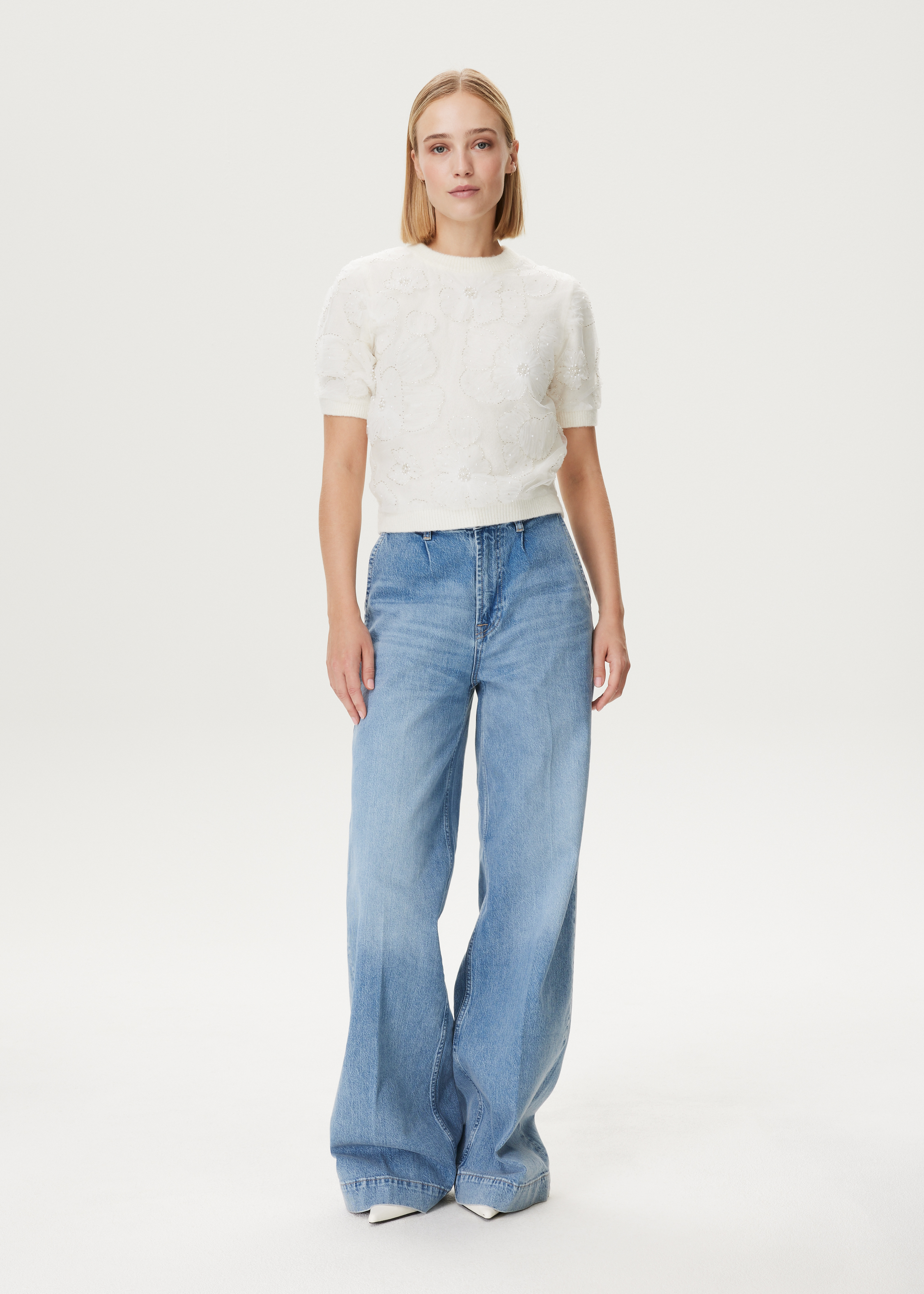 Trui met bloemen mesh