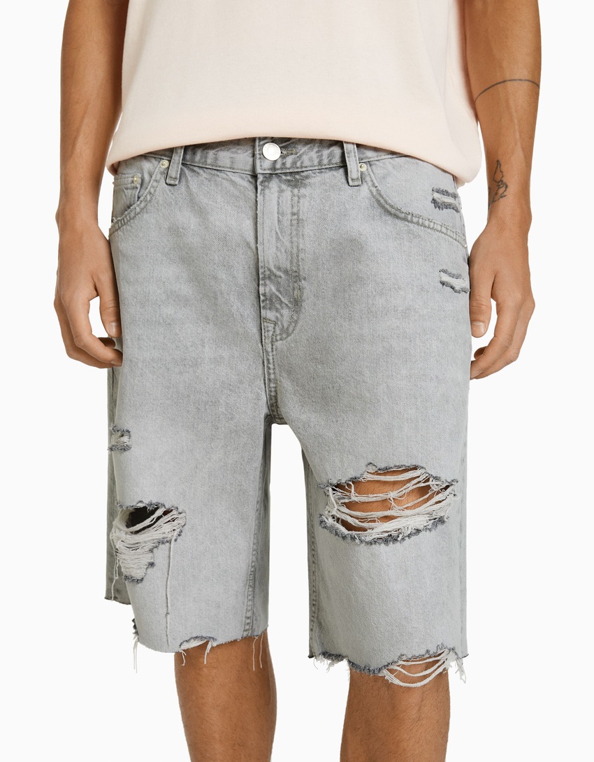 Bermuda jeans rasgada de corte justo