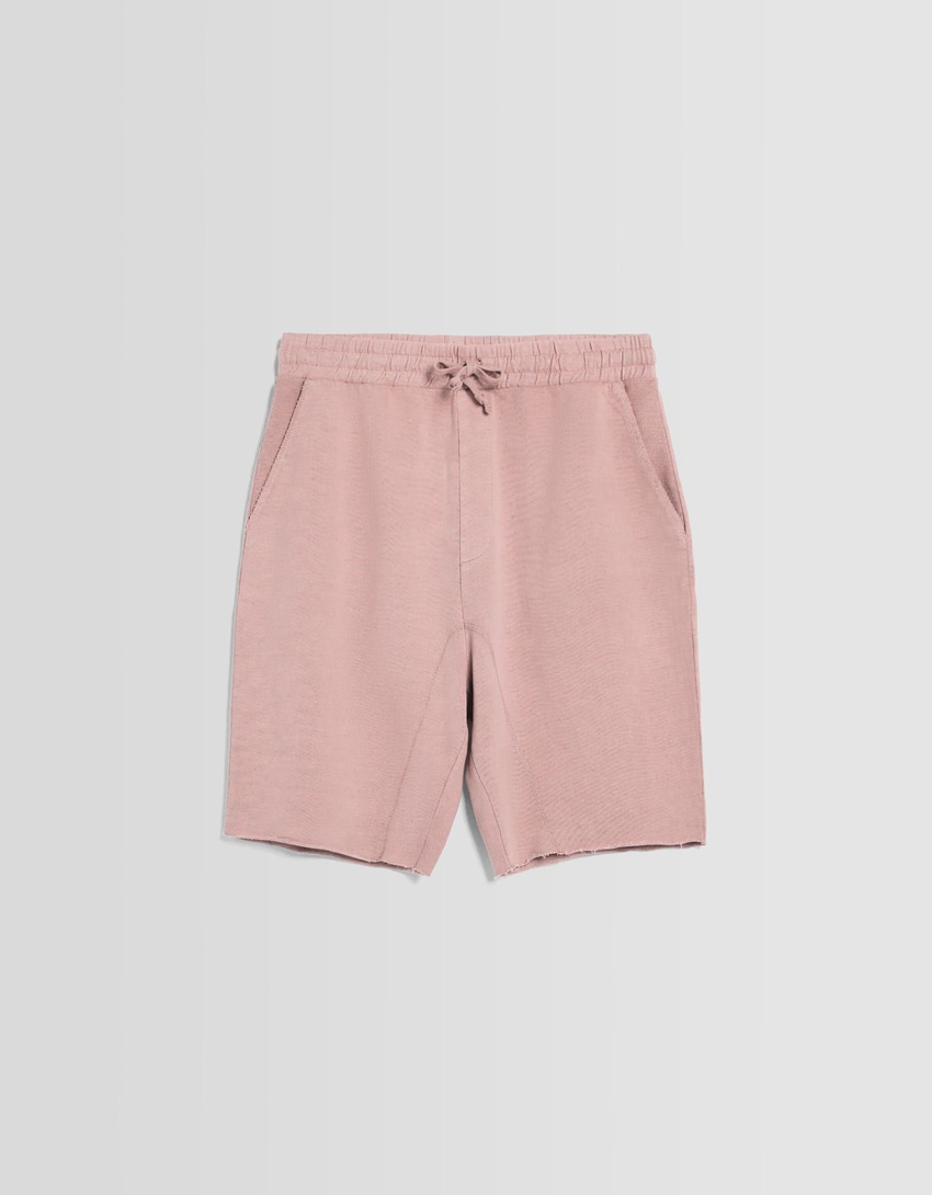 Bermudas de pelúcia com efeito desbotado