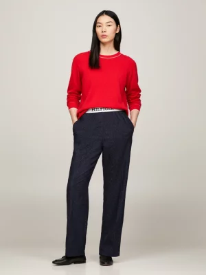 Calças com cós elástico e logotipo na cintura.