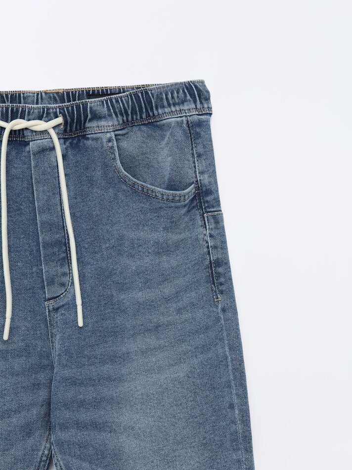 Calça jeans jogger elástica - Índigo