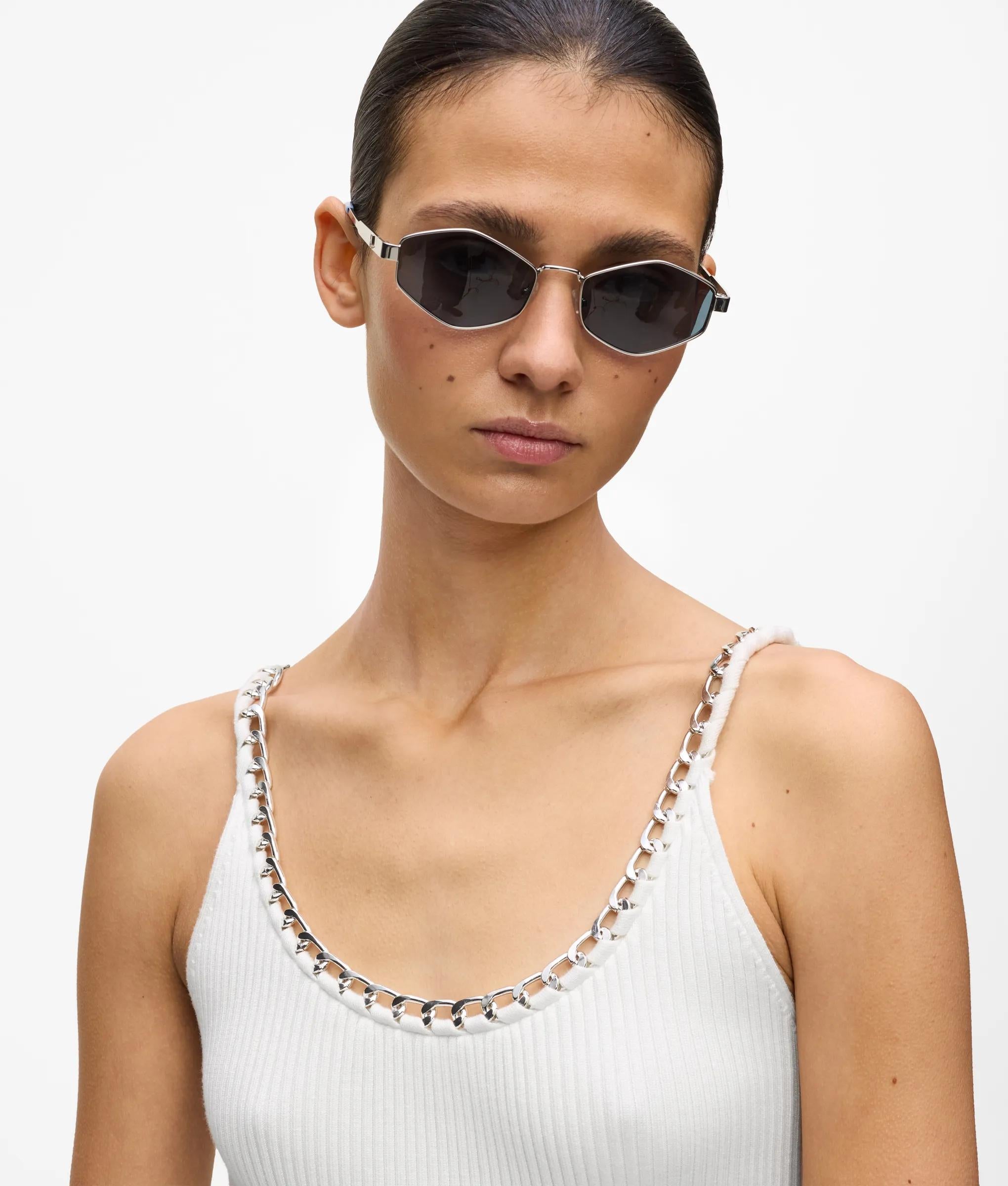 Gebreide top met kettingdetail