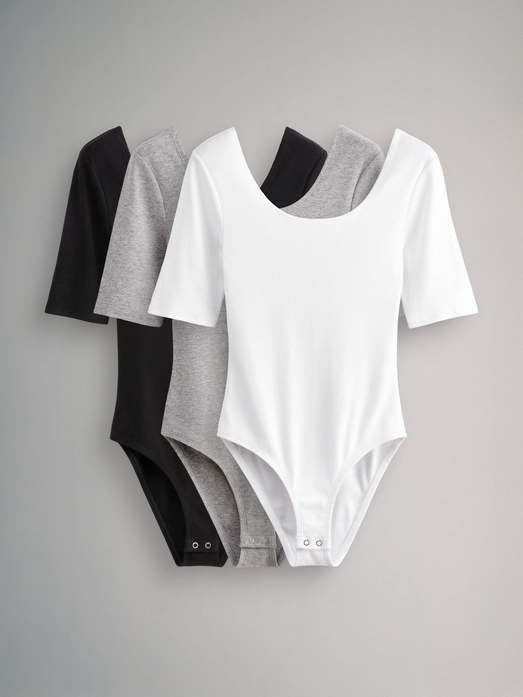 The Set 3 Pack Ribbed Scoop Neck Bodysuits