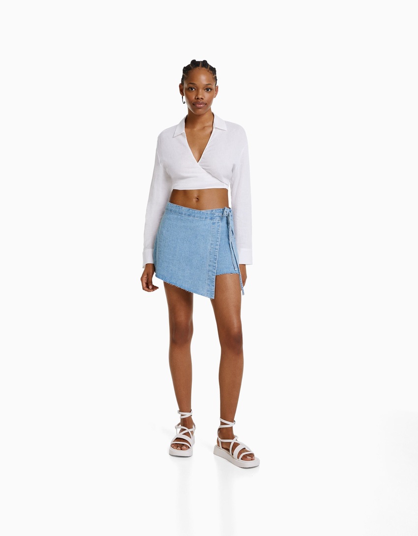 Saia-calça jeans com nó lateral