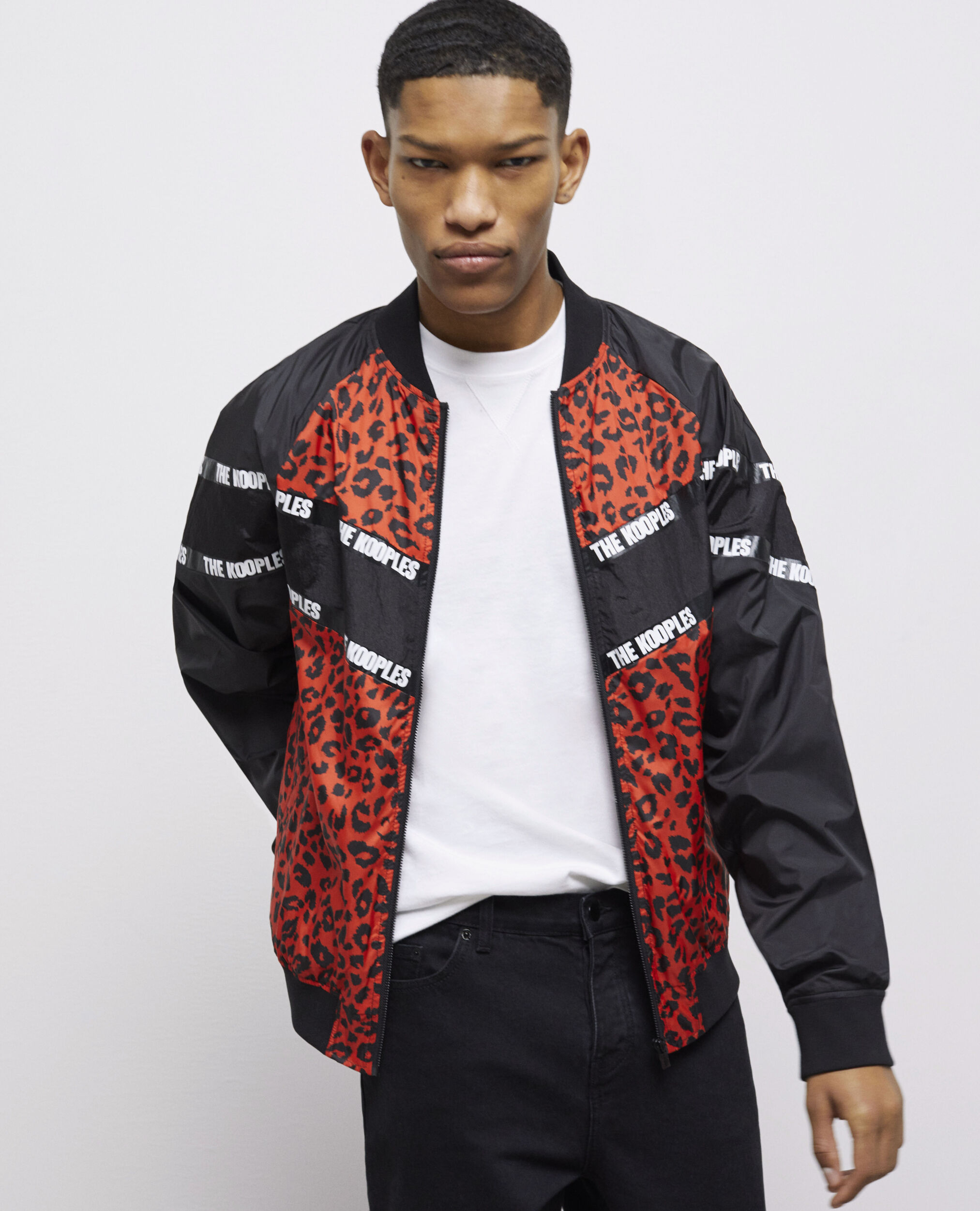 Blouson bicolore avec bandes logo