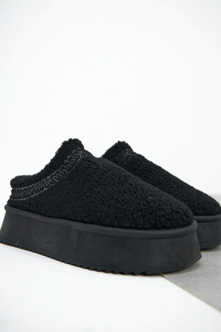 Bottines chaussons en peau de mouton compensés noires