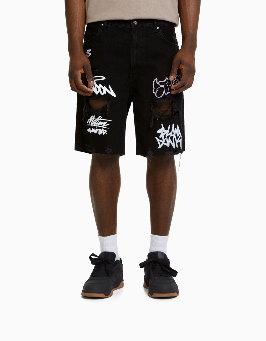 Bermuda jeans estampada e rasgada