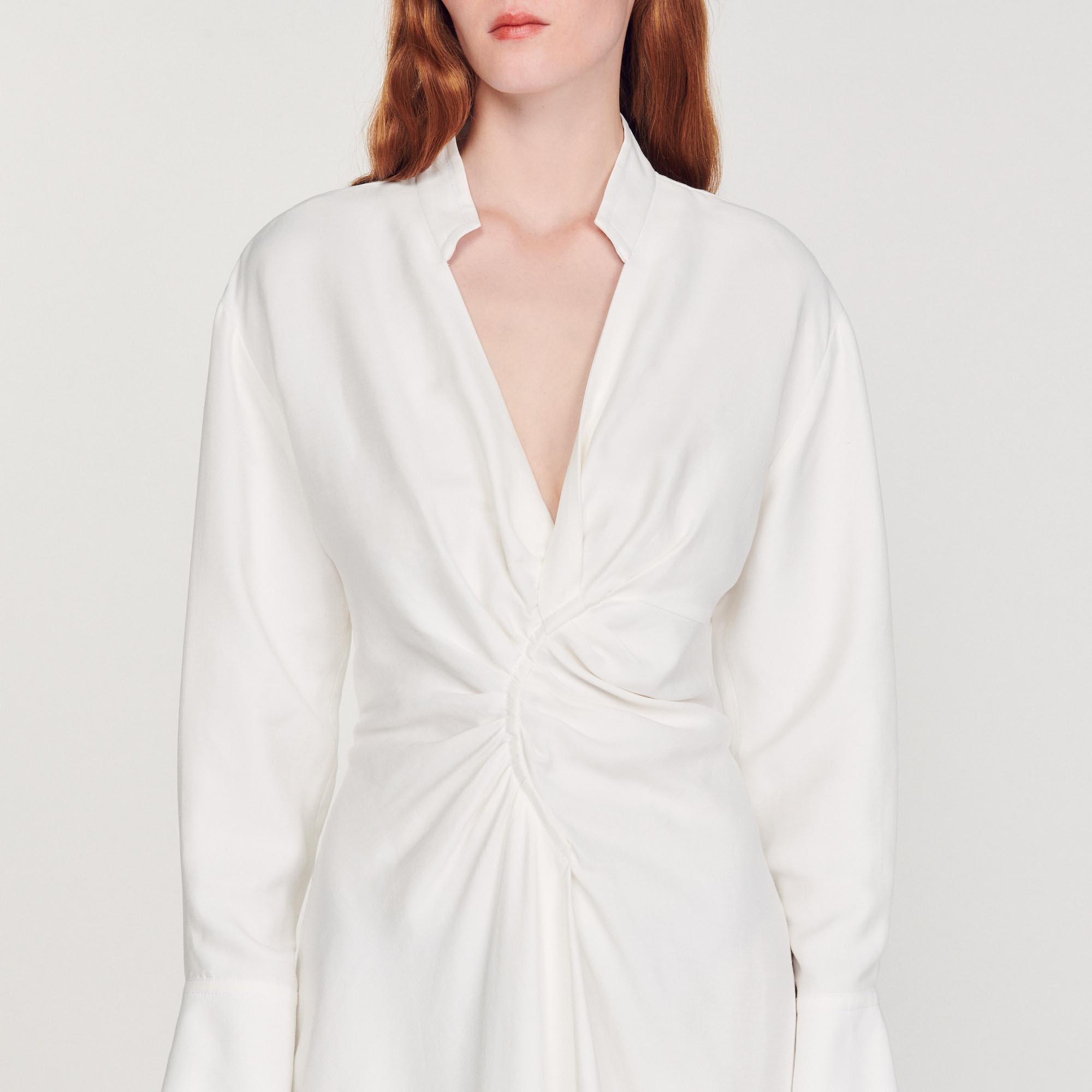 Robe courte á manches longues