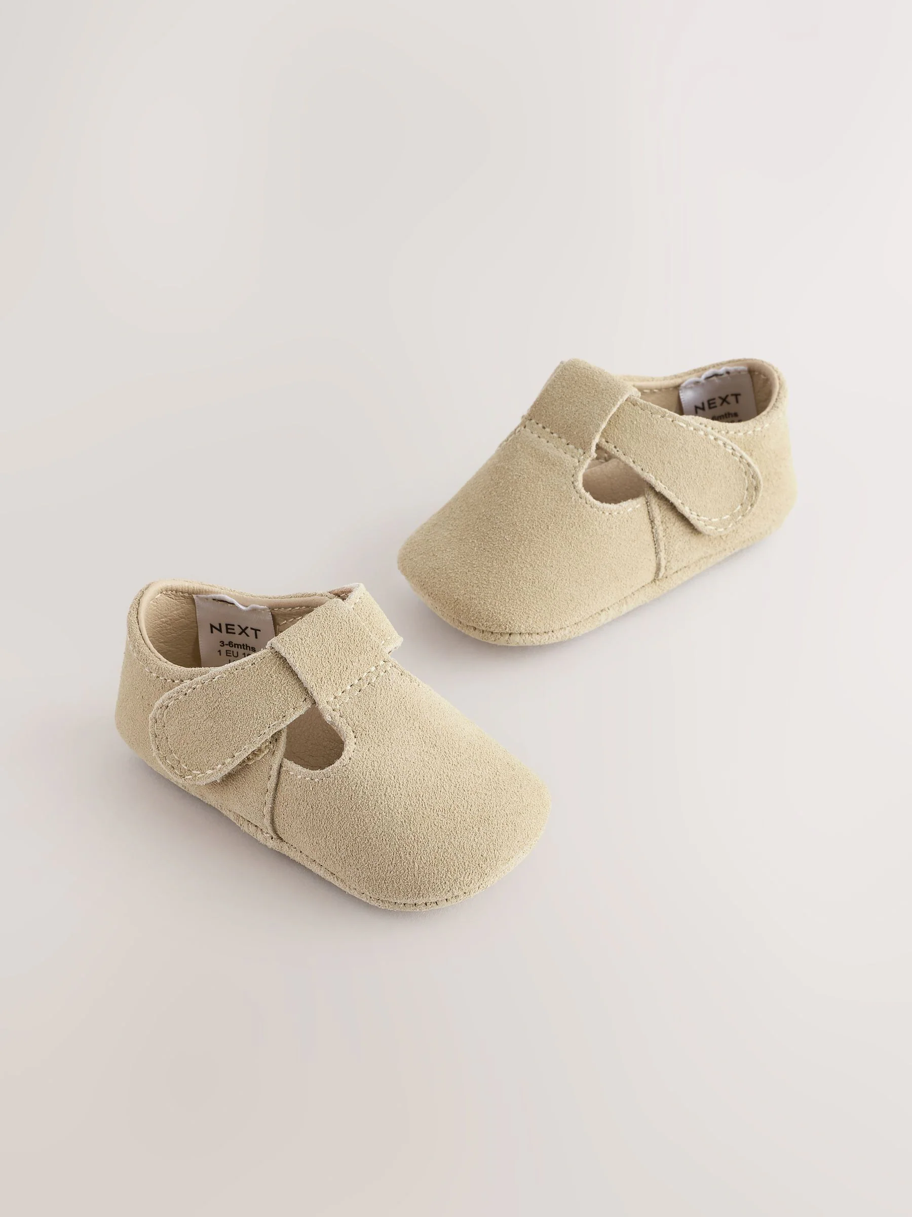 Kiezelkleurig suède - Leren babyschoen met T-bandje (0 - 24 mnd)