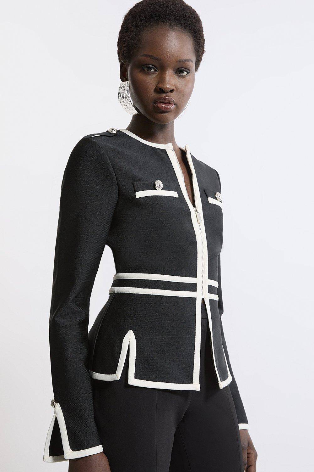 KarenMillen Veste en maille à ourlet fendu, effet bandage sculptant la silhouette, avec passepoils contrastés militaires.