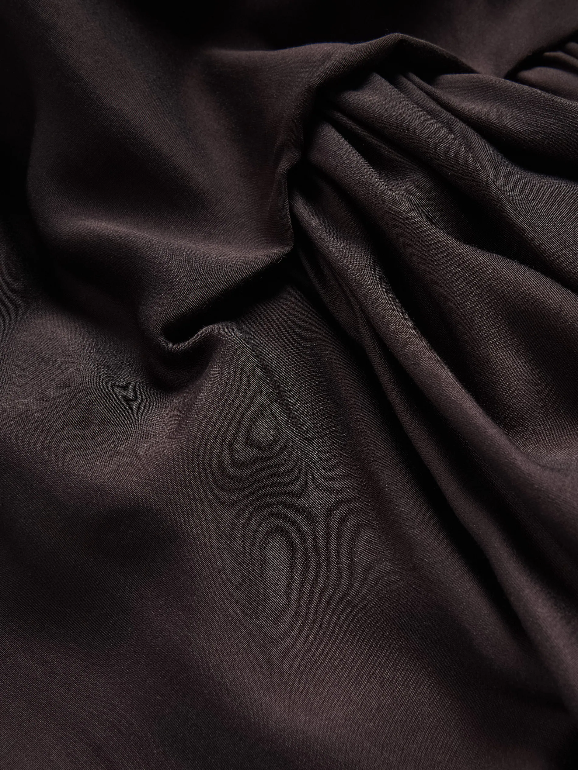 Bluse mit asymmetrischem Saum