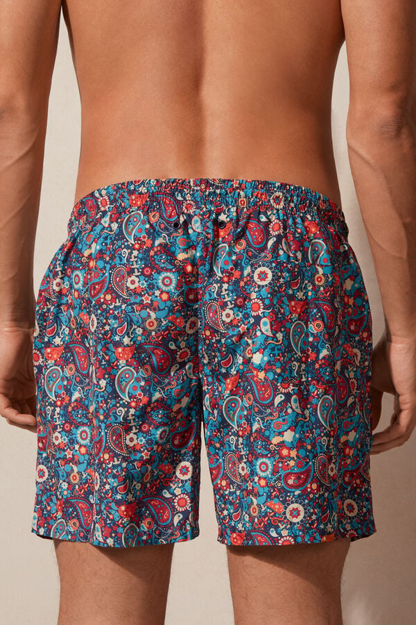 Maiô boxer de cashmere laranja com estampa.
