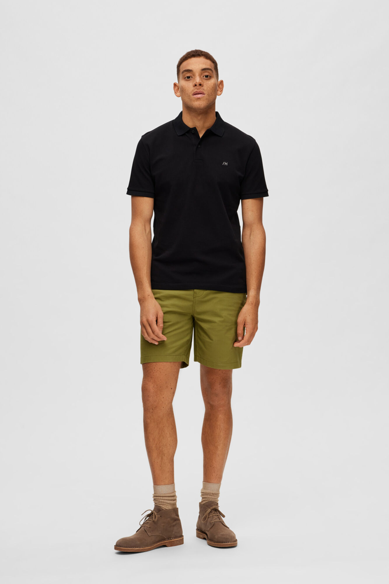 Camisa polo de manga curta com logo em destaque, 100% algodão orgânico - Preta