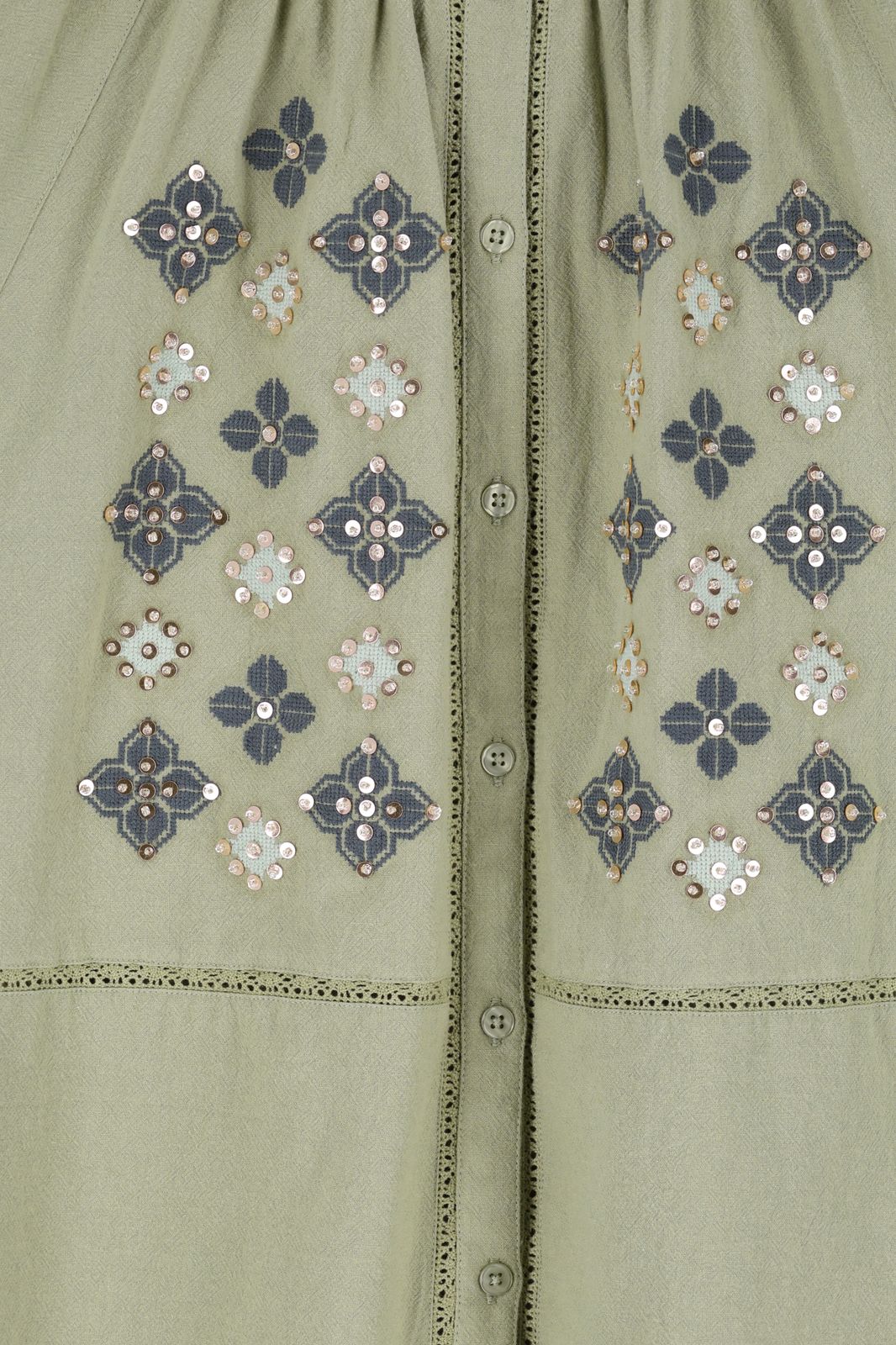 Lichtgroene blouse met borduurwerk