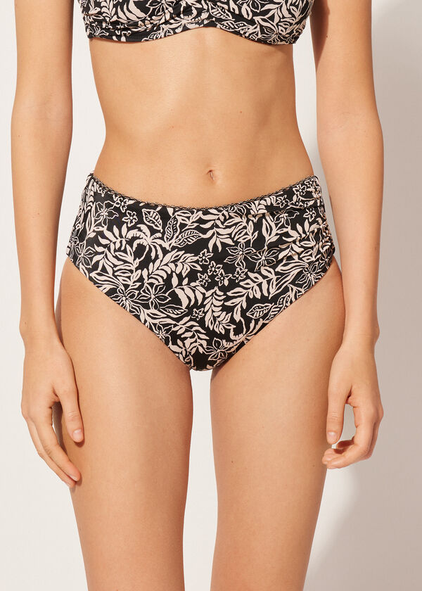 Calcinha de biquíni de cintura alta modeladora com estampa botânica em preto e branco.