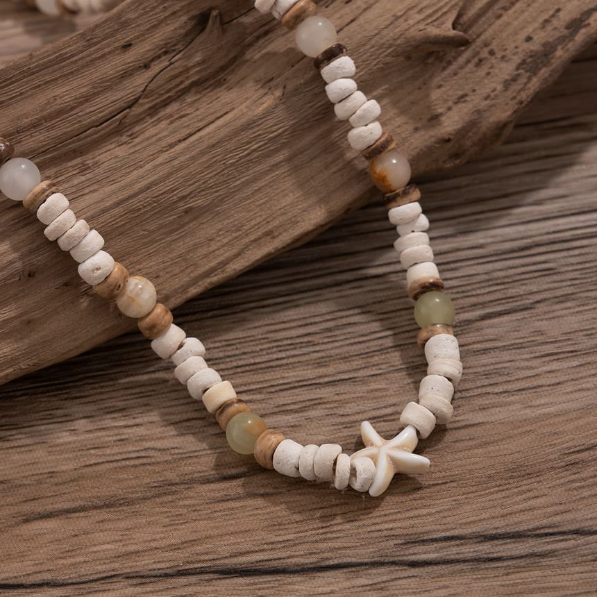 Gretlyn - Witte schelp zeester kralen ketting