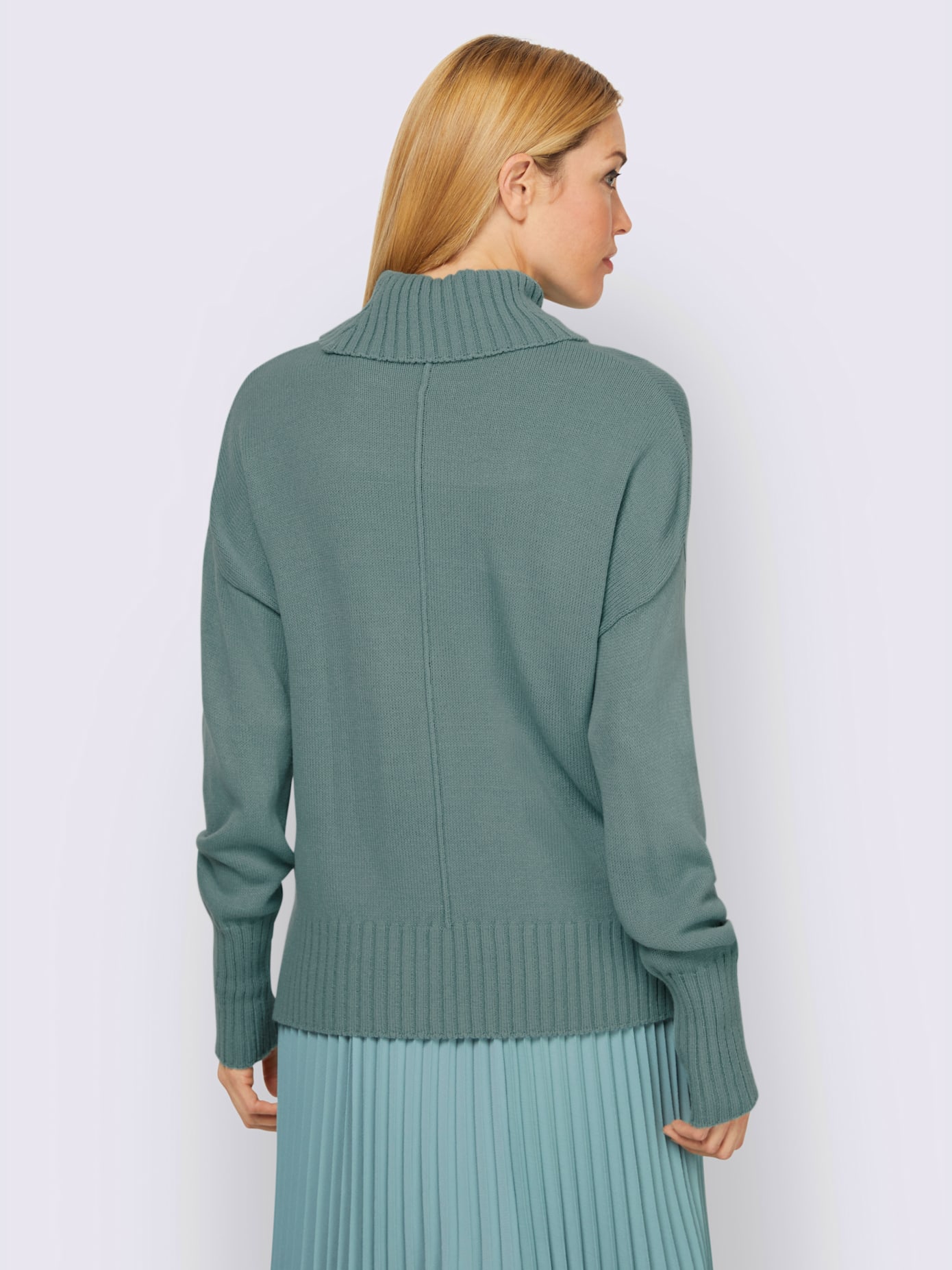 Pull col roulé flatteur