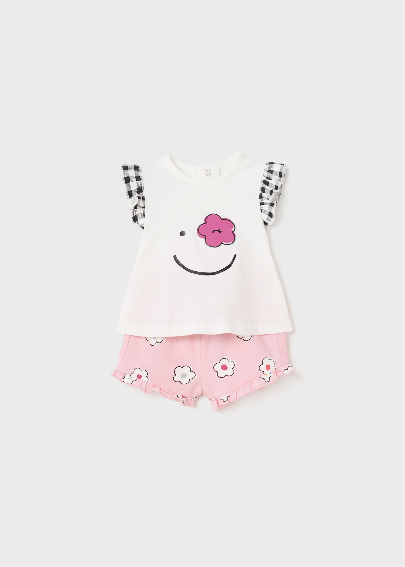 Conjunto de 4 peças em algodão sustentável para recém-nascidos.