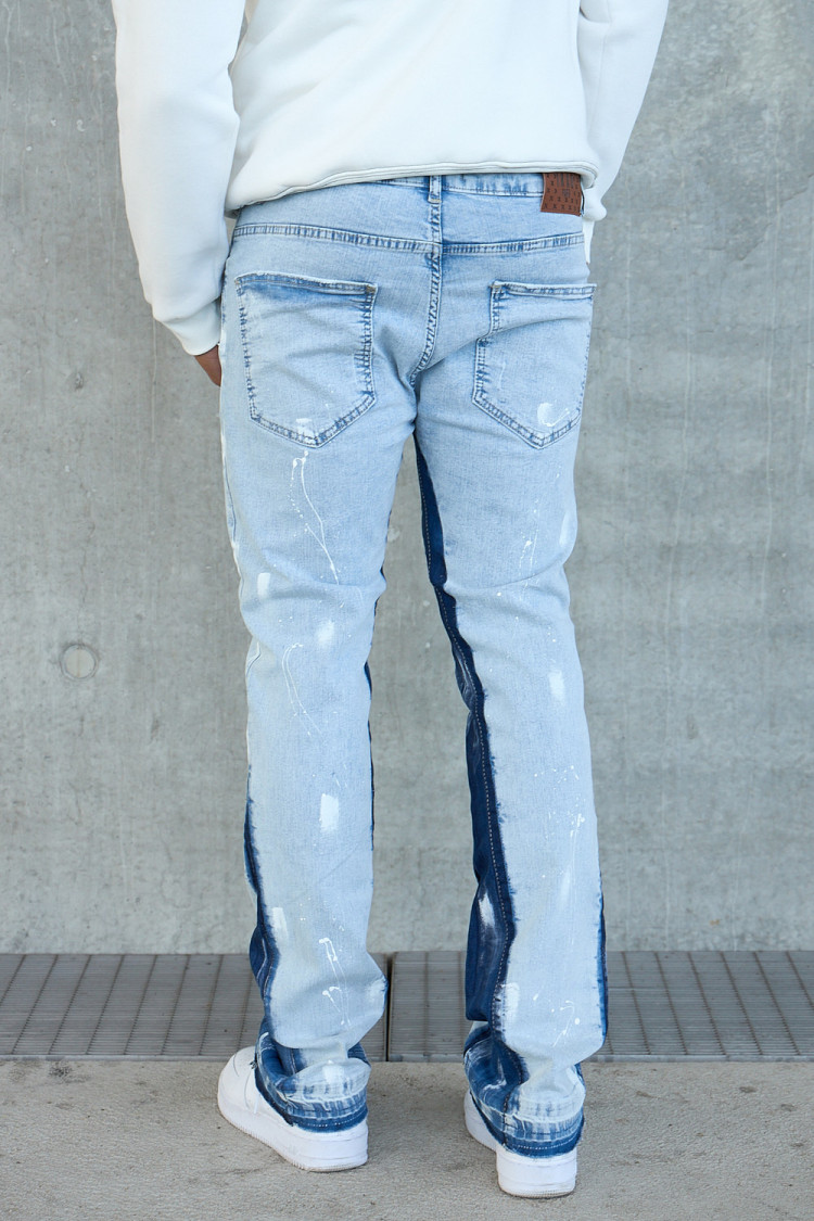 Jean bleu clair taché à empiècement bleu clair