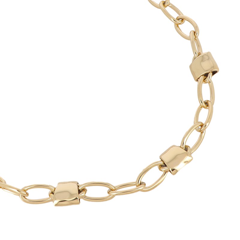 Collier en acier doré composé de gros anneaux et de trois pendentifs lisses