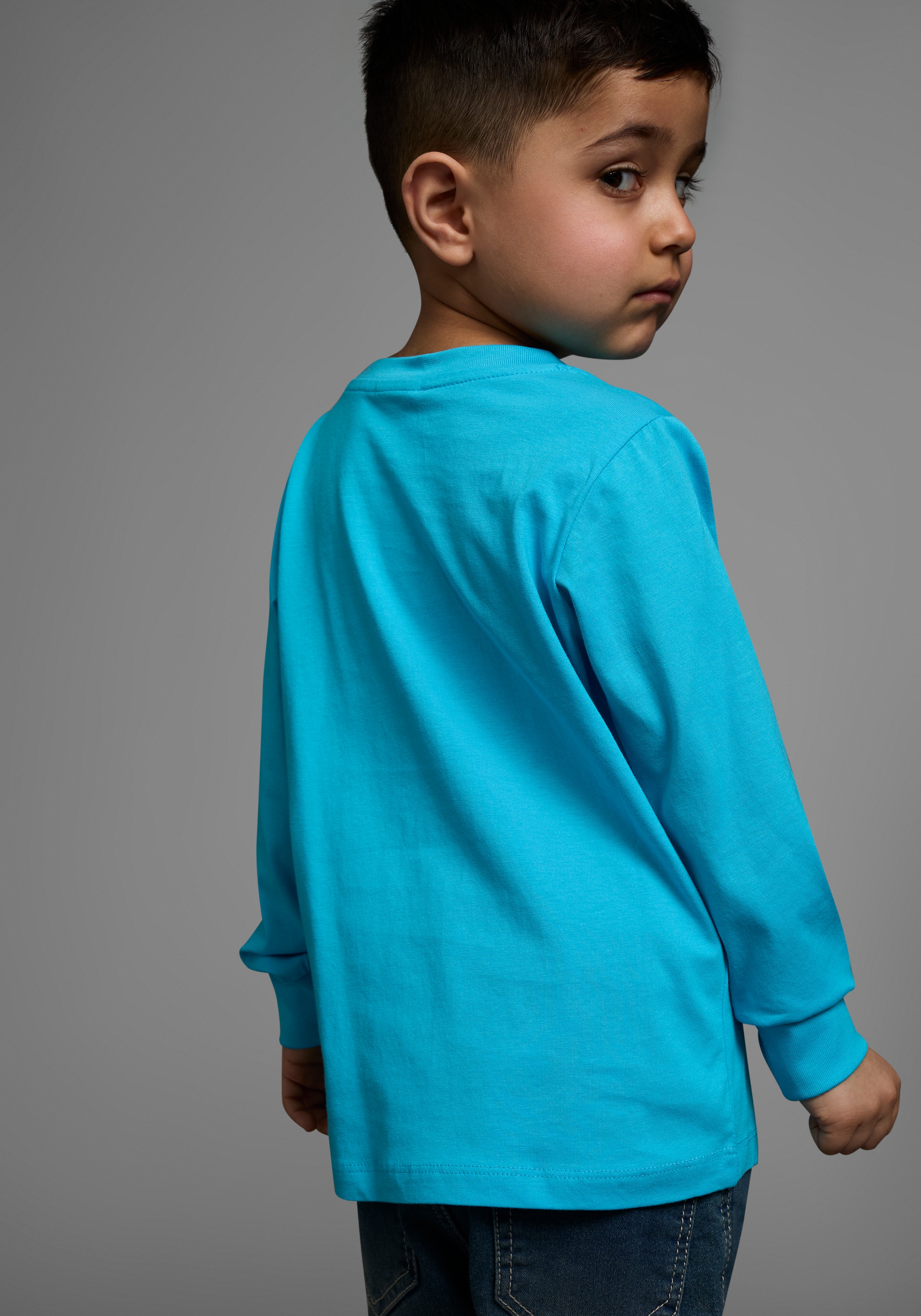 KIDSWORLD Langarmshirt »HIER KOMMT RETTUNG« Langarm,  Basic-Passform,  peppiger Druck
