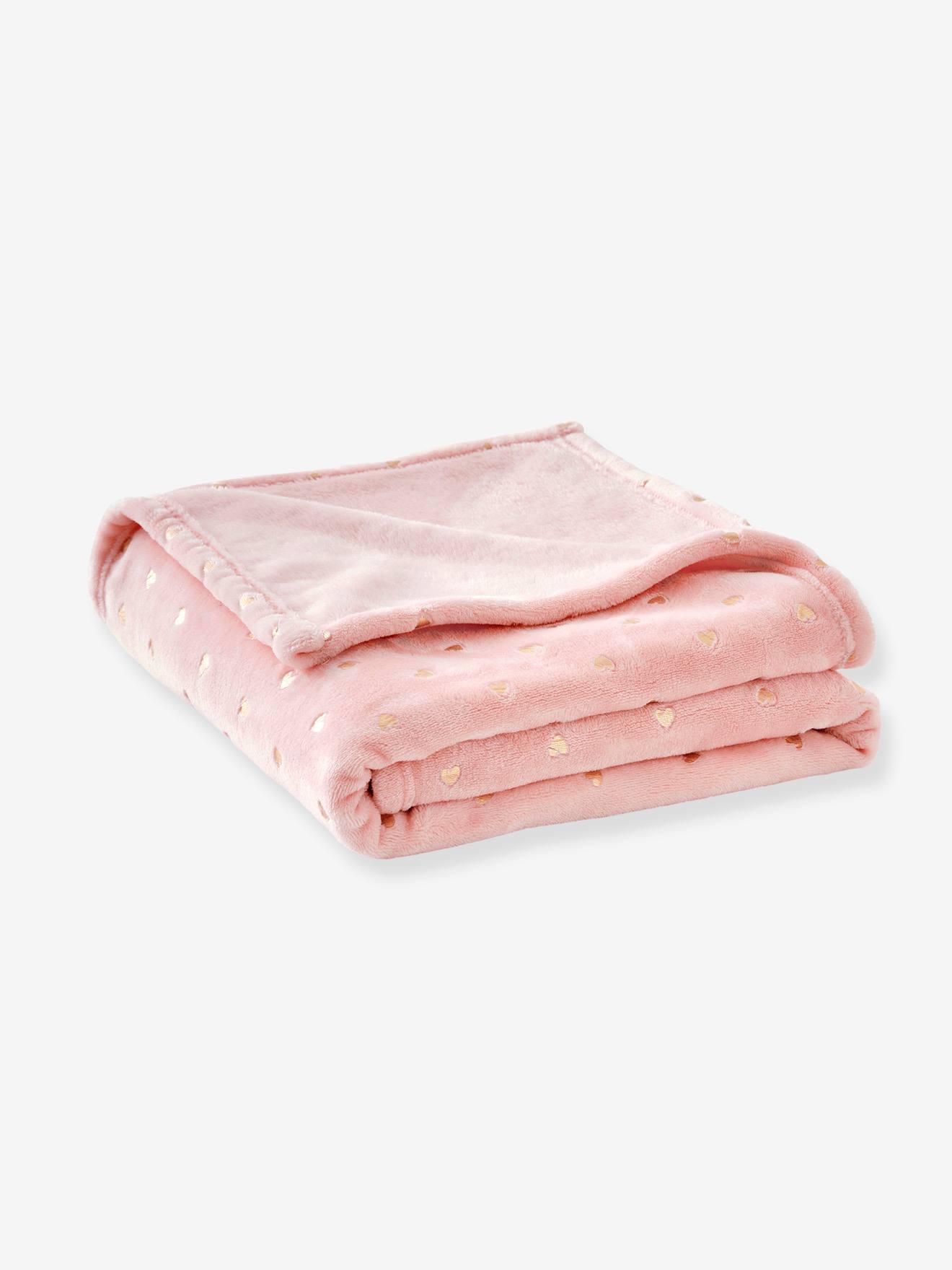 Manta infantil com corações dourados, lisa e branca com estampas.