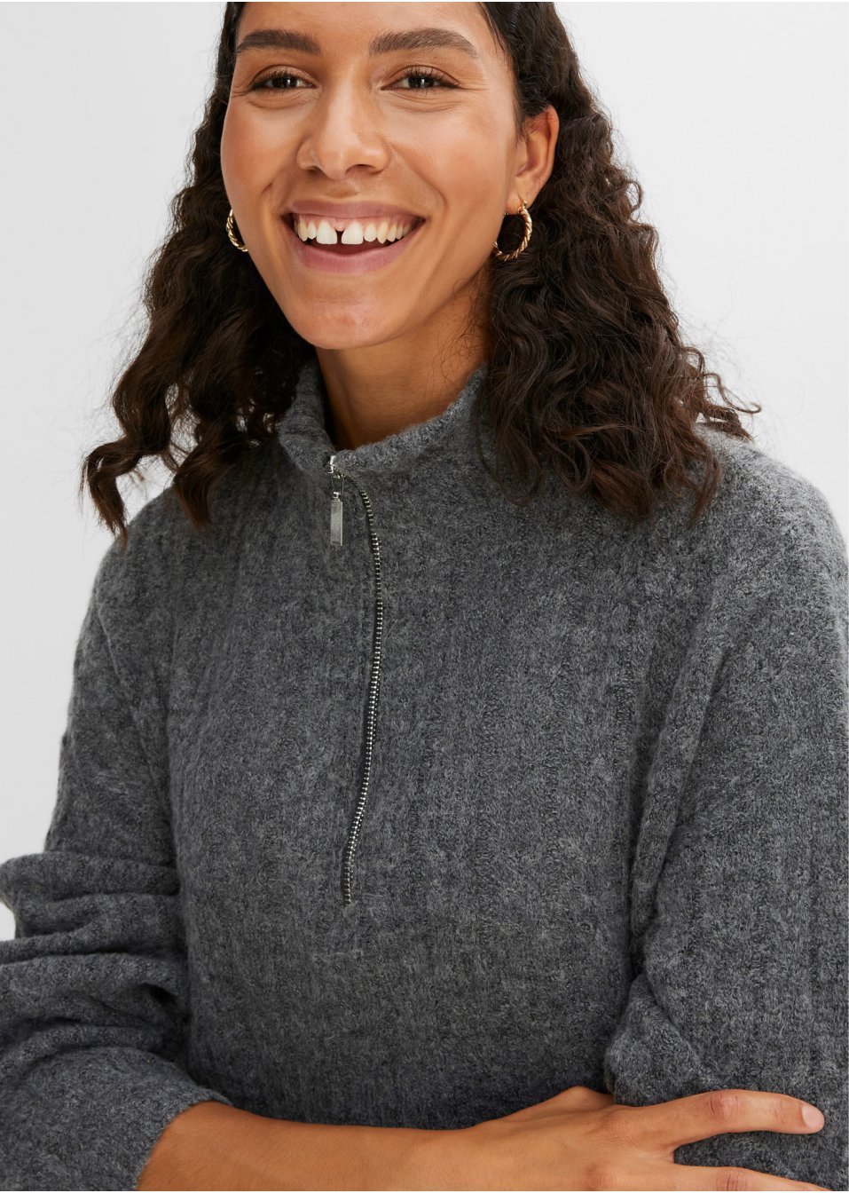 Pull long avec motif torsadé