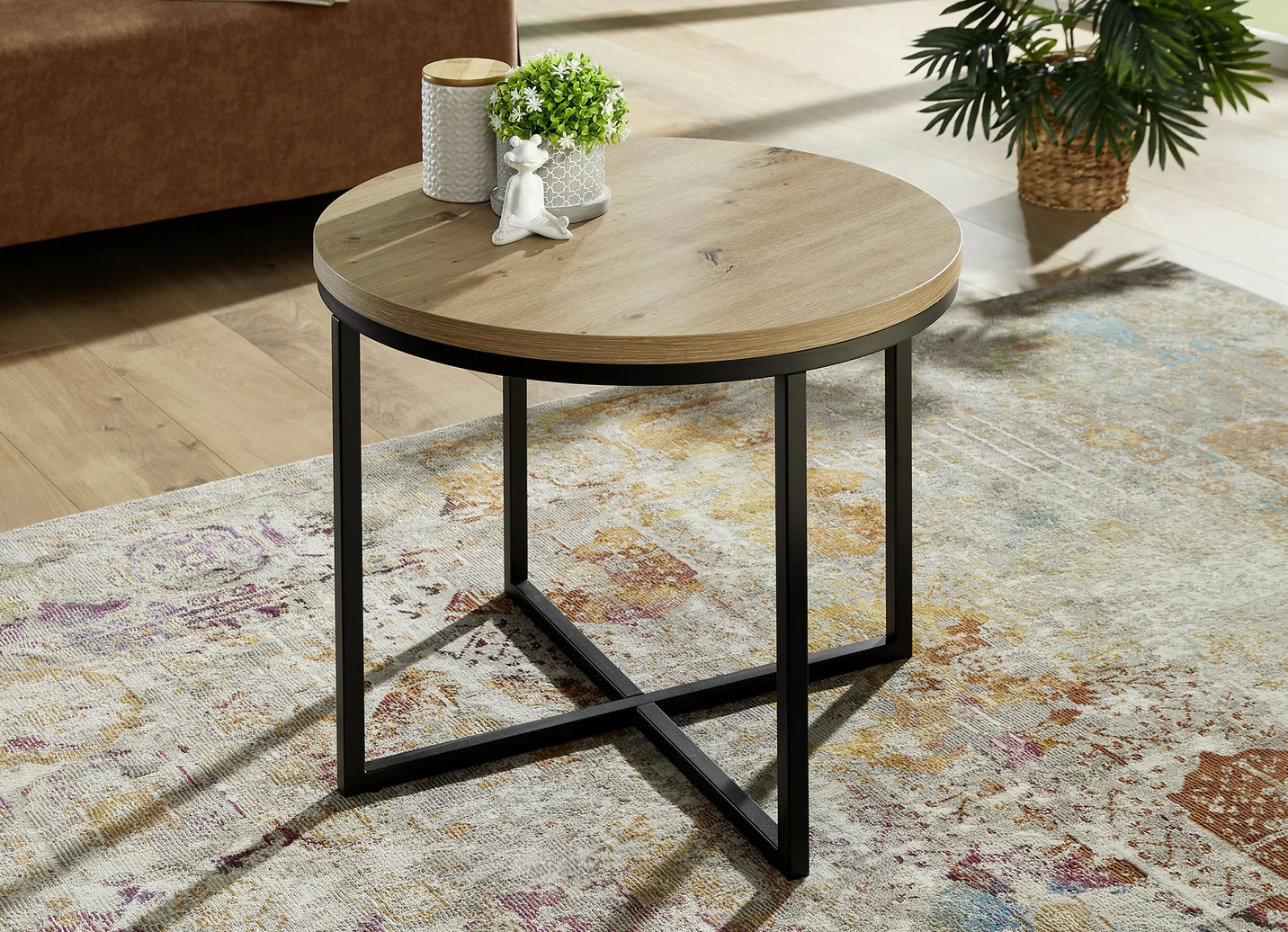 Runder Couchtisch mit schwarzem Metallgestell