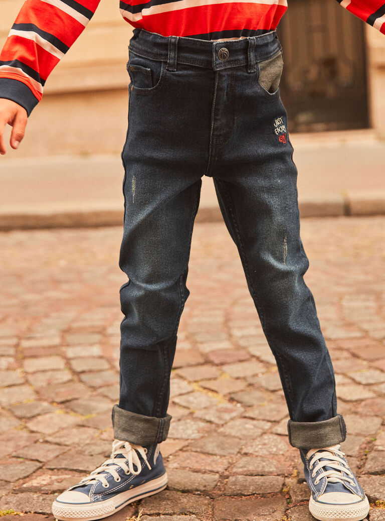 Jean slim denim brut brodé