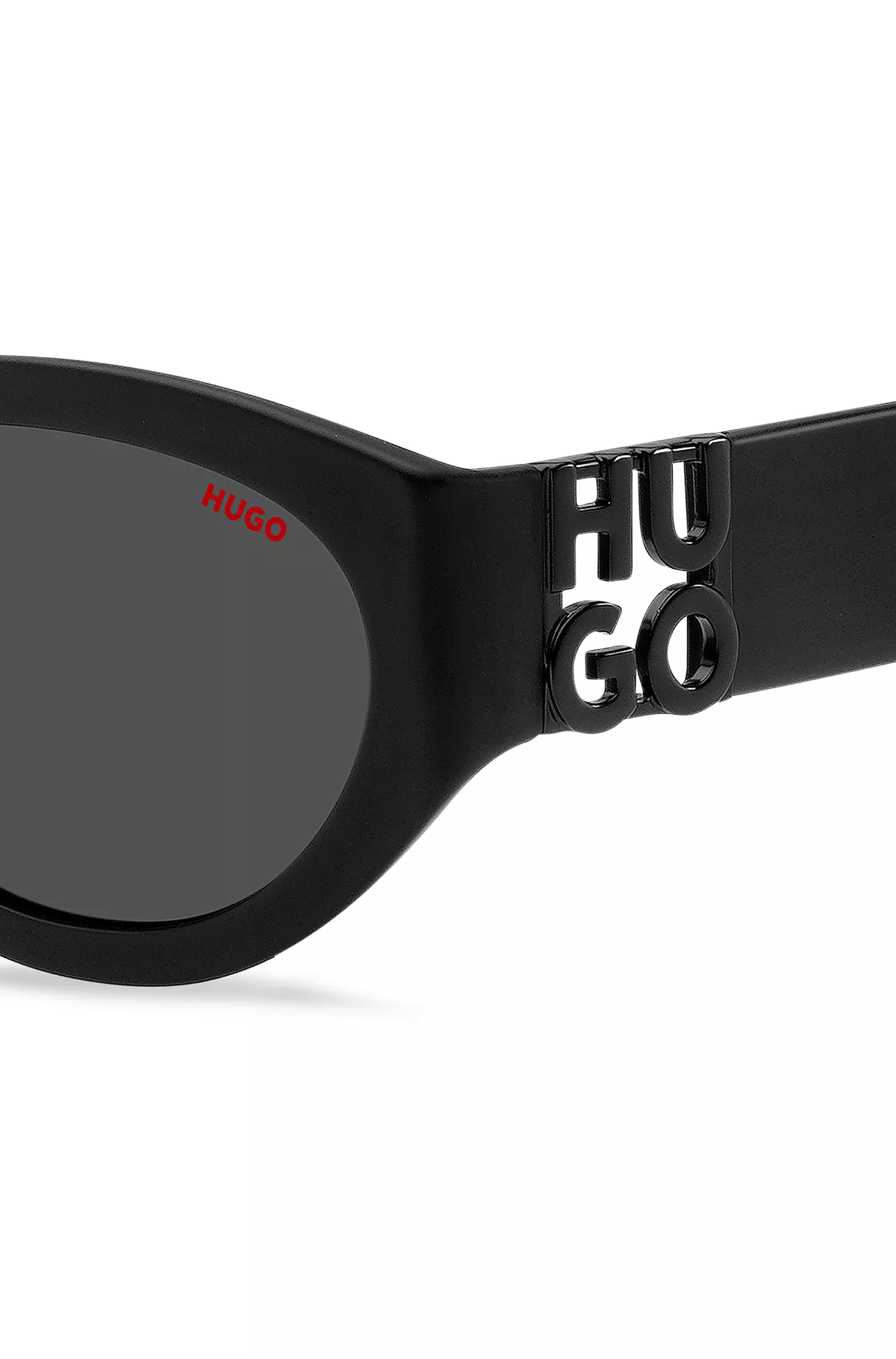 Óculos de sol HUGO em acetato vermelho e preto com monograma 3D.