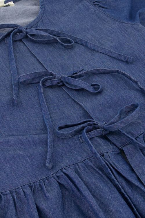 Blauwe denim top met strikjes en pofmouwen