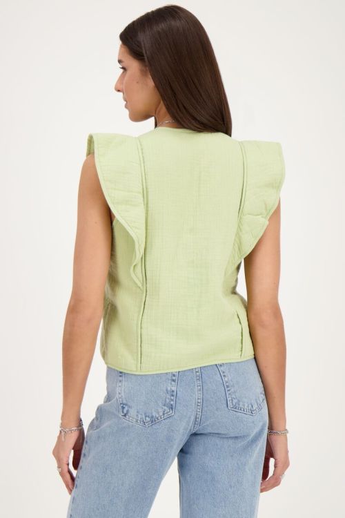 Groen gilet met strikjes en ruffles