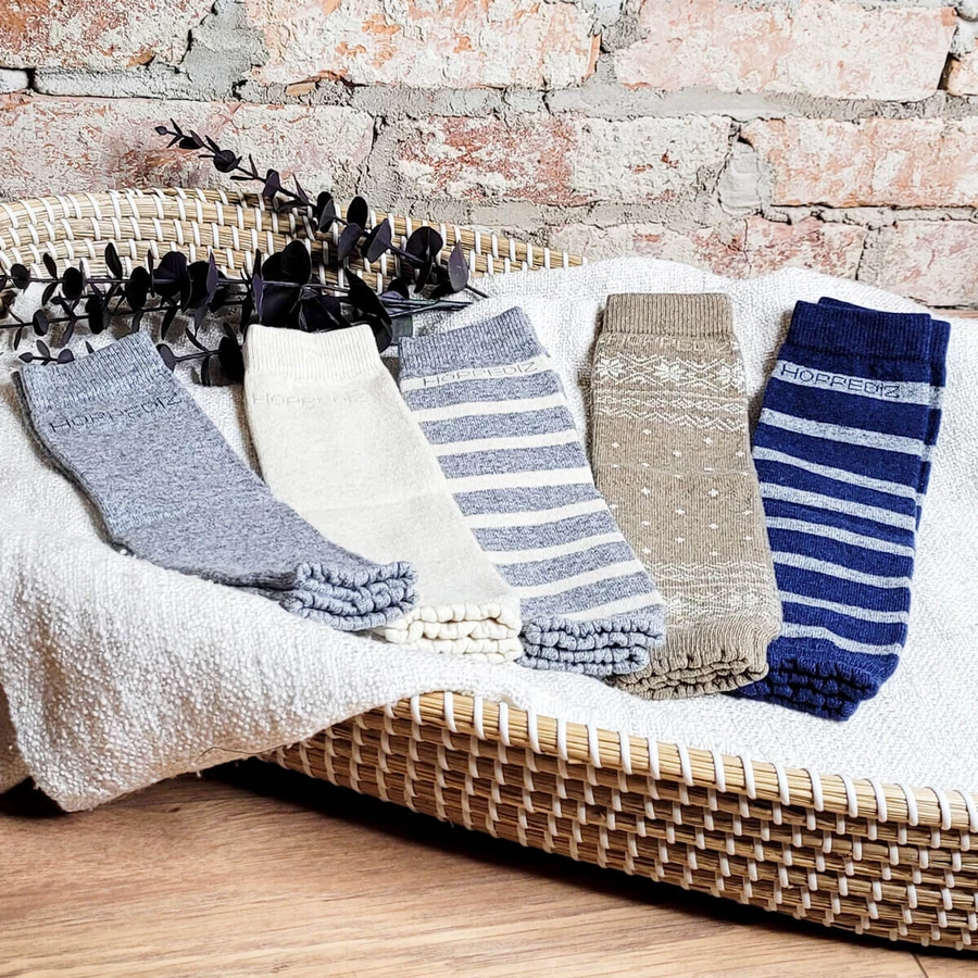 Hoppediz Beinstulpen Merino-Babystulpen gestreift graucreme