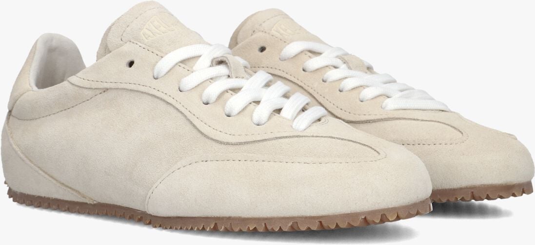 beige axel arigato lage sneakers daze runner