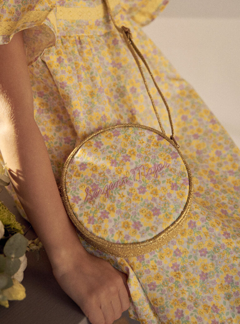 Sac doré pailleté à fleurs