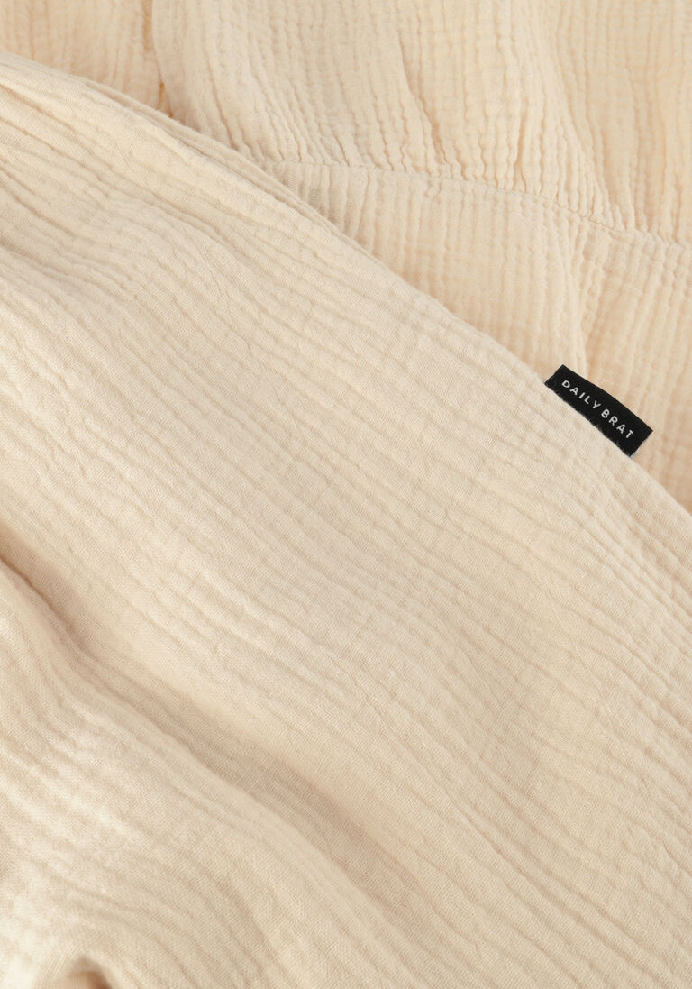 DAILY BRAT beige daily brat flared broek sheom ruffle pants