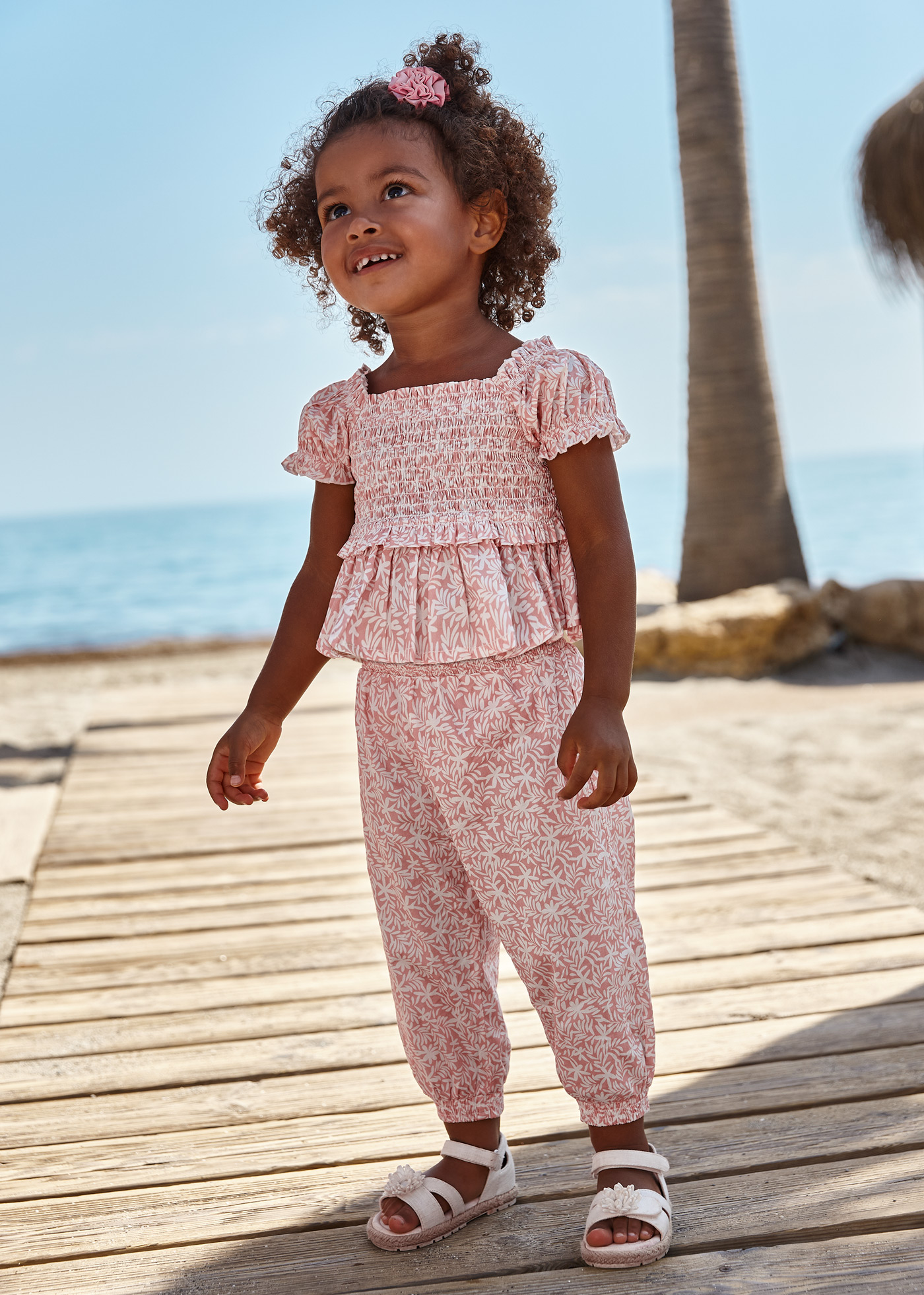 Calças largas de algodão estampado para bebê