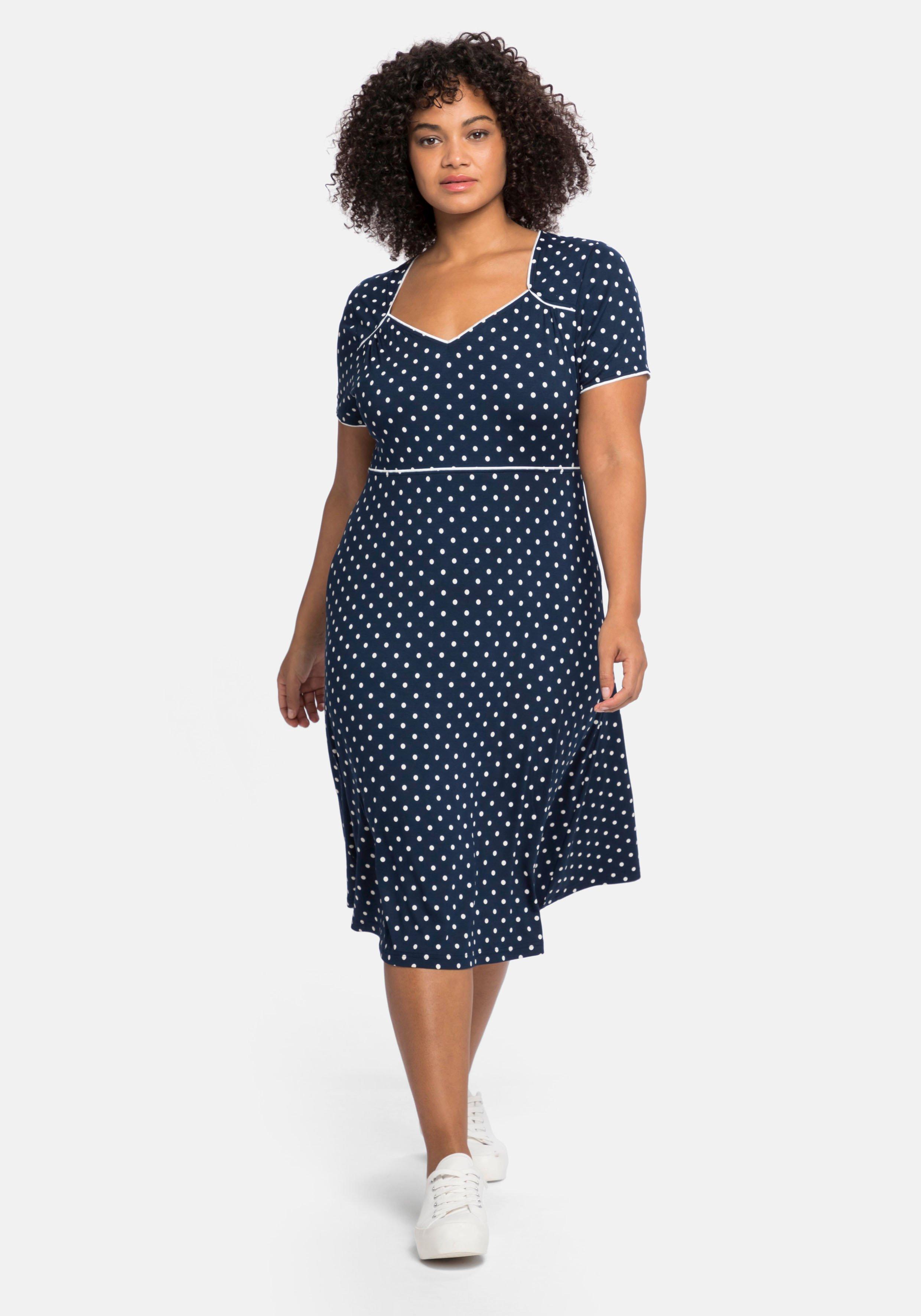 Jerseykleid mit Punktedruck und Paspelierung