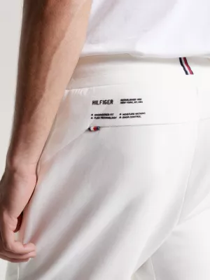 Calça de moletom esportiva essencial com logo tonal e punhos canelados