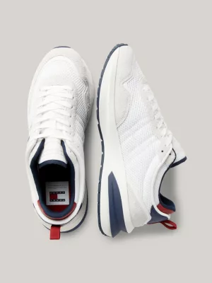 Tênis de corrida com sola grossa de couro