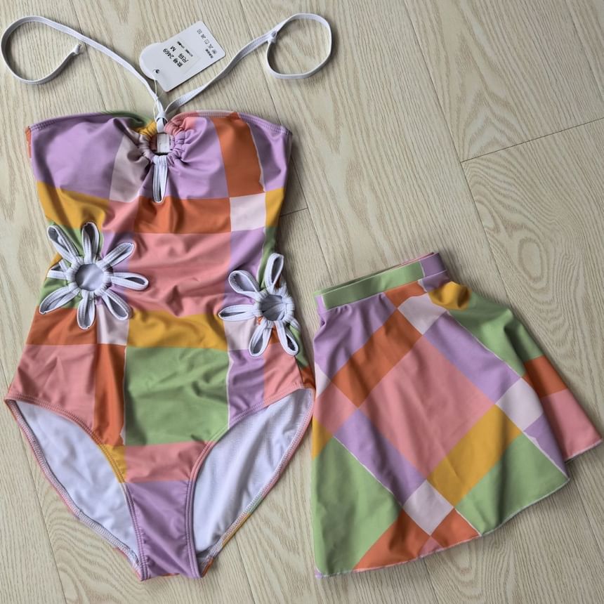 Sabbia - Set: Halter-hals badpak met bloemenuitsnijding + bedekkende rok