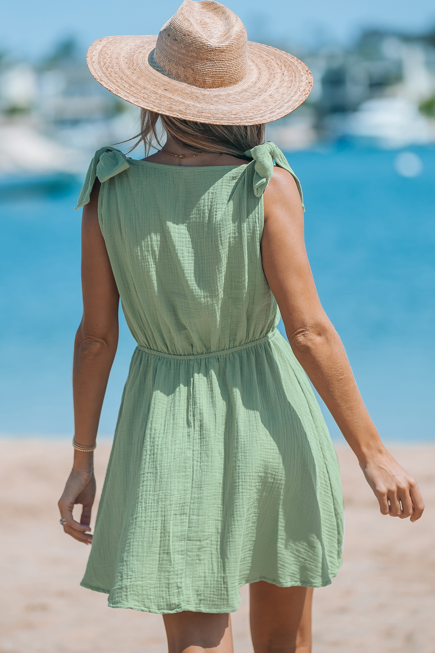 Robe mini en pur coton avec col surplis à nouer sur l'épaule