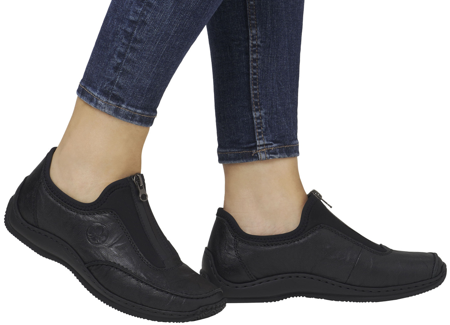 Rieker Slipper aus genarbtem Nappaleder und dehnbarem Textilmaterial