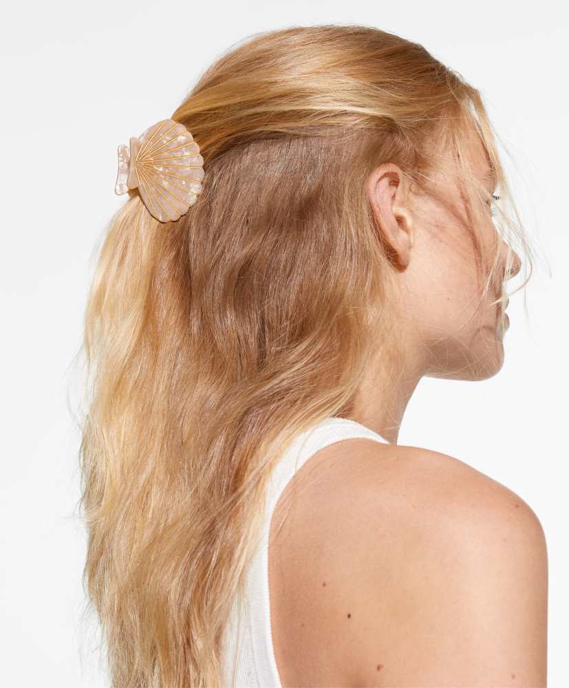 Presilha de cabelo em formato de concha