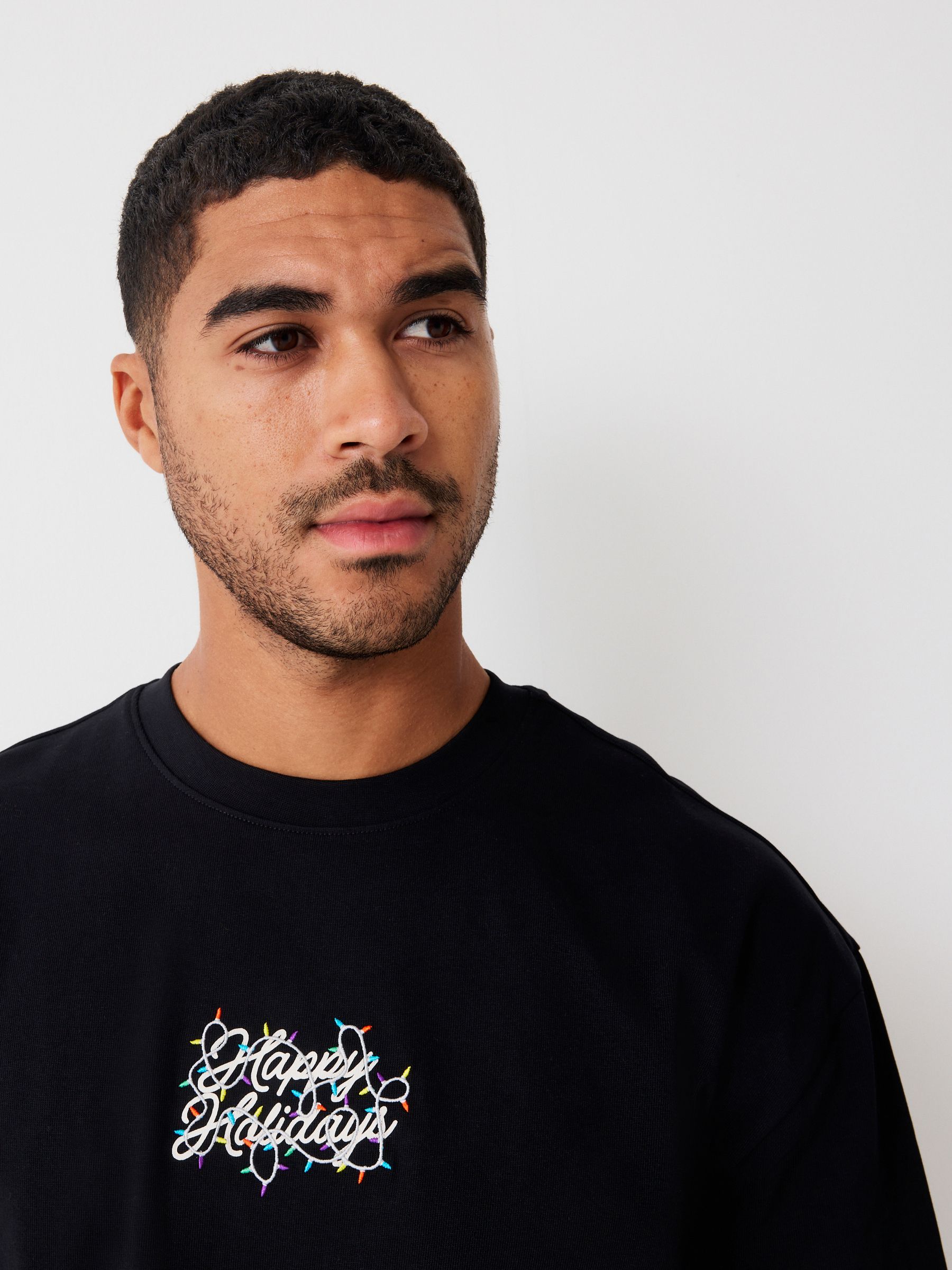 Zwart met tekst - Relaxed fit - Kerst T-shirt