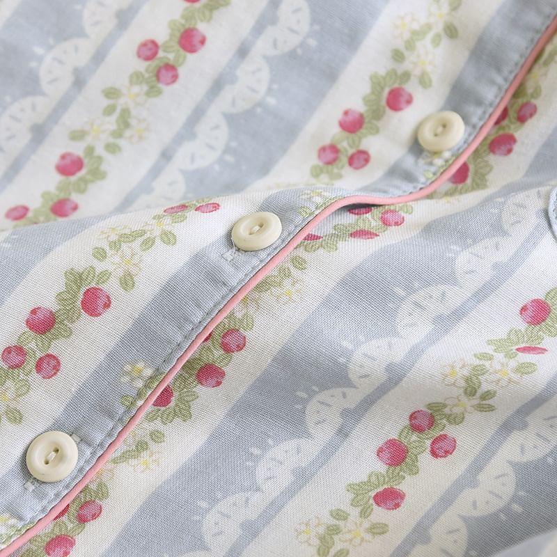 Somnus - Pyjamaset: Top met lange mouwen, reverskraag, bloemenprint en knoopjes + broek
