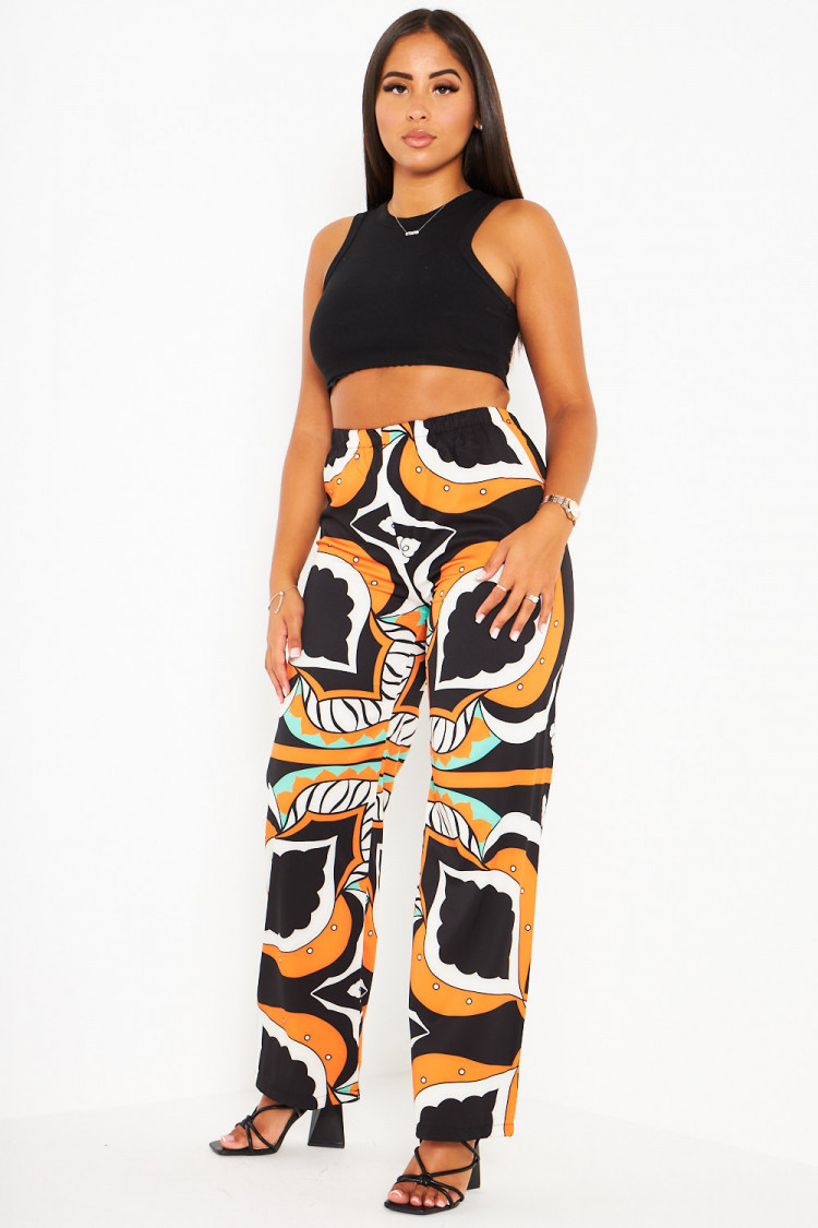 Pantalon orange large et baroque