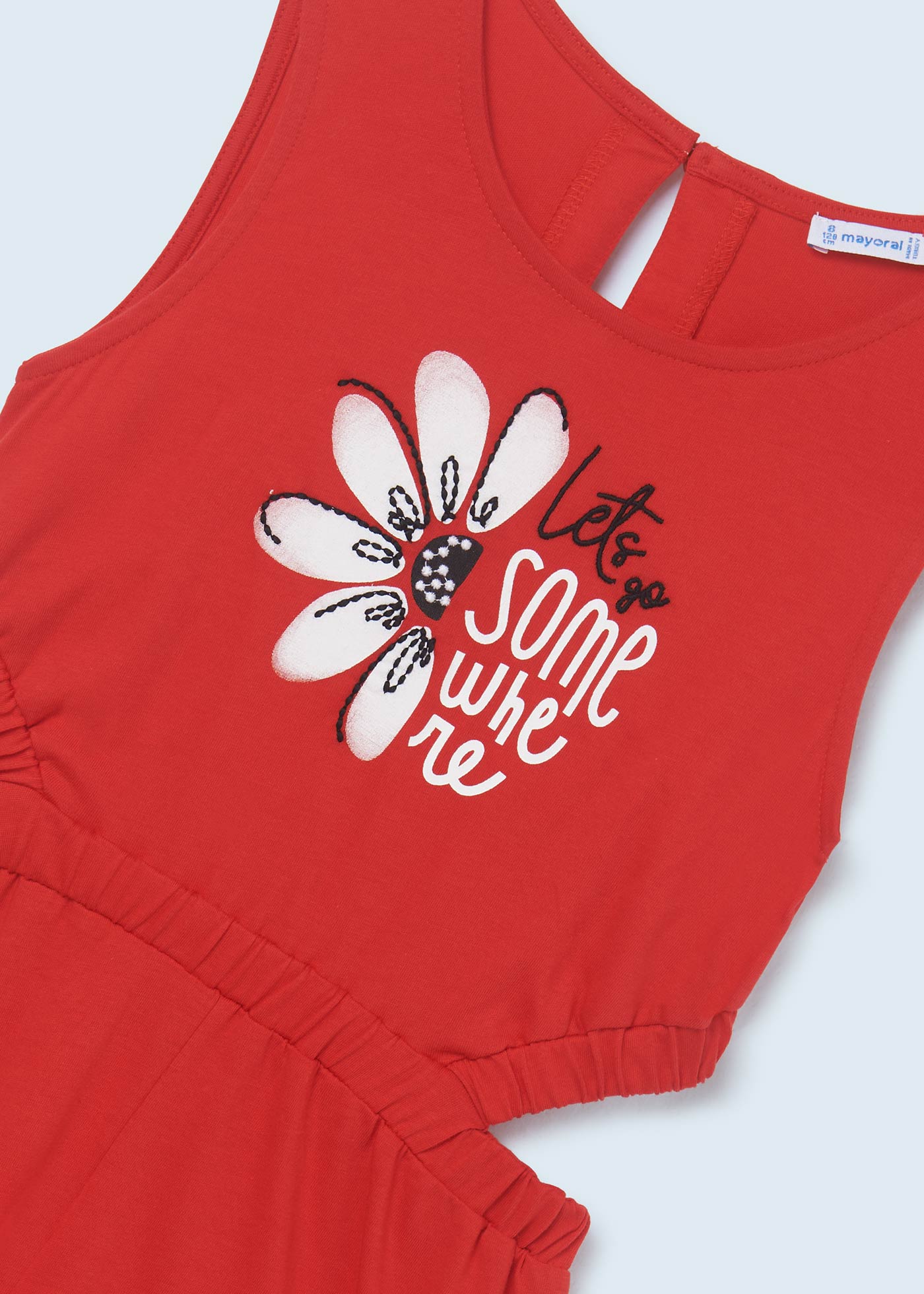 Macacão curto com estampa floral para menina