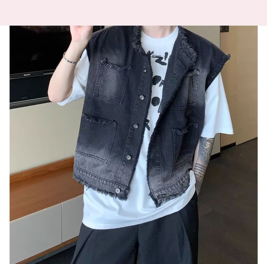 Maxelane - Gewassen denim vest met kwastjes en knoopjes